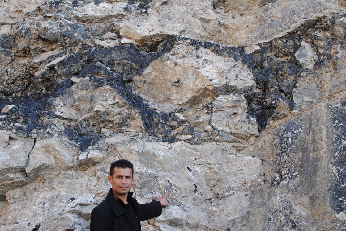 Figure 3. Bitumen-filled fault porosity in the carbonate Bekhme Formation, Iraqi Kurdistan. Such porosity and permeability in the subsurface would make a supreme metal or petroleum reservoir. Photo ©2010 Graham Banks